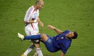 Materazzi collapses to the ground after Zidane's headbutt